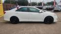 2014 Toyota Camry (4T4BF1FK1ER) , located at 16710 Clay Rd., Houston, TX, 77084, (281) 859-7900, 29.834864, -95.656166 - Photo#1